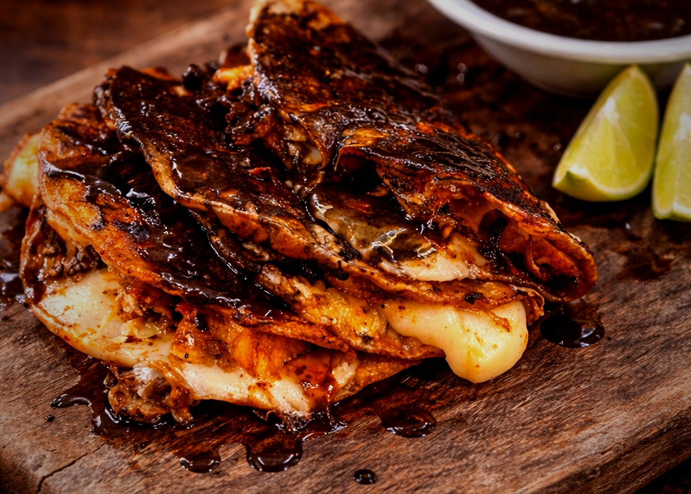 Charred octopus tacos with adobo glaze