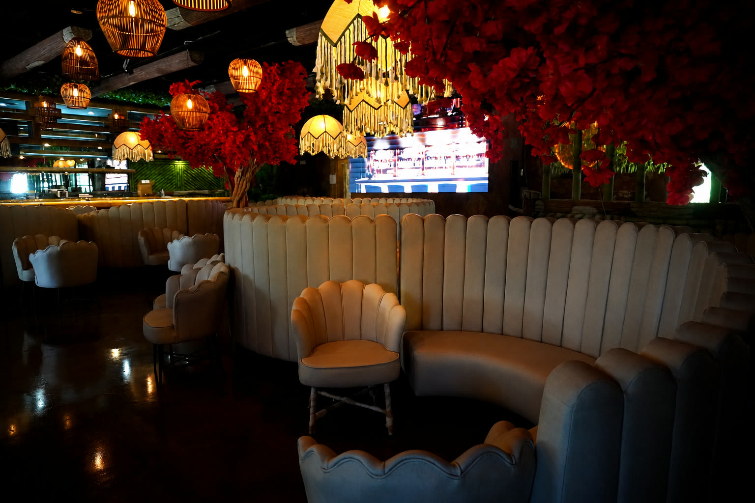 Casa Tequila Prime dining area — circular booth seating with interior bloom tree