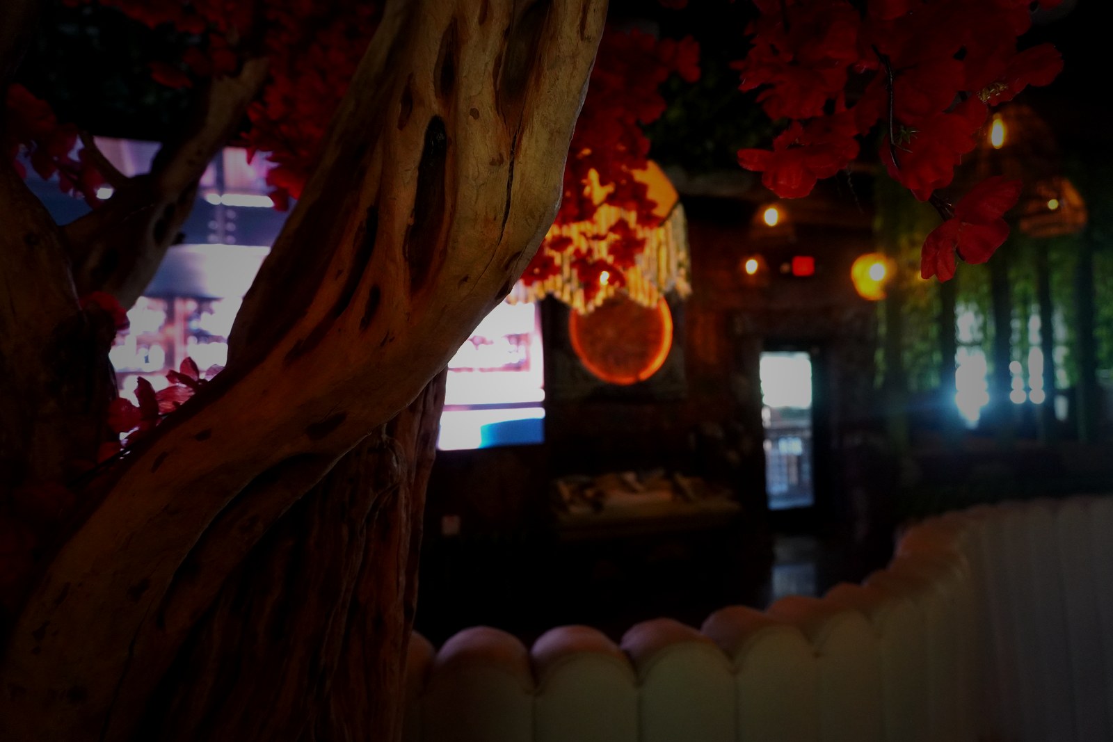 Ornate wooden tree trunk detail — Casa Tequila Prime interior